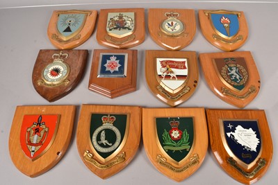 Lot 538 - A collection of wooden Regimental wall plaques