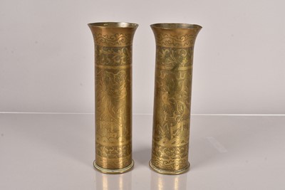 Lot 543 - A pair of well decorated trench art shell