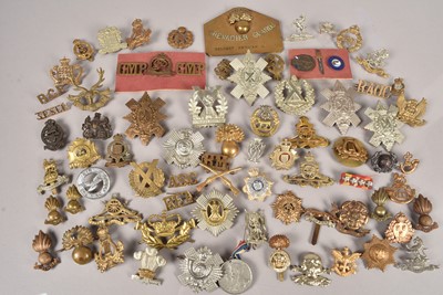 Lot 644 - A good selection of British cap badges and titles