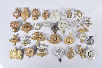 Lot 696 - A group of British Military Cap badges