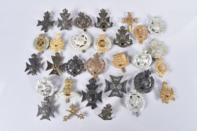 Lot 697 - An assortment of British cap badges