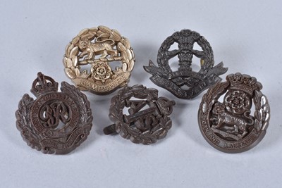 Lot 710 - Three WWII Plastic Economy cap badges