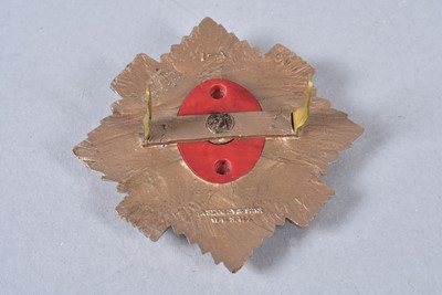 Lot 713 - A collection of WWII Plastic Economy cap badges
