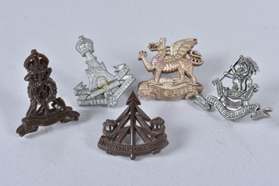 Lot 714 - Three WWII Plastic Economy cap badges