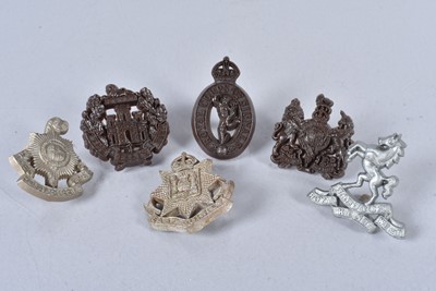 Lot 715 - Three WWII Plastic Economy cap badges by Stanley & Sons