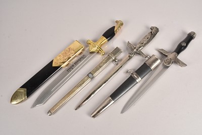 Lot 792 - A selection of Reproduction German Daggers