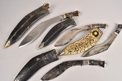 Lot 799 - A group of four Middle Eastern Kukri knives