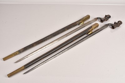 Lot 830 - Two 1876 Martini Henry Socket Bayonets