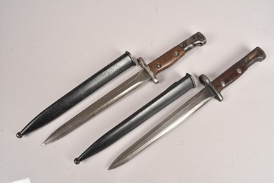 Lot 839 - Two Belgian SAFN M1949 bayonets and scabbards