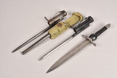 Lot 845 - Two Sten Gun bayonets