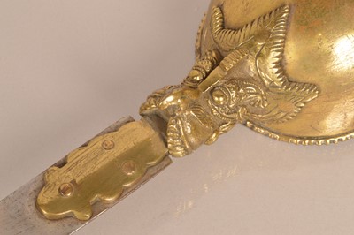 Lot 887 - A late 19th Century/ early 20th Century Indian Gauntlet sword (Pata)