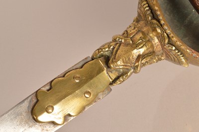 Lot 887 - A late 19th Century/ early 20th Century Indian Gauntlet sword (Pata)