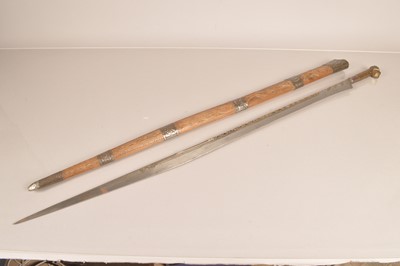 Lot 905 - A North African Flyssa sword