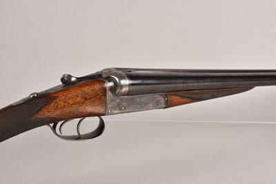 Lot 941 - An E.J Churchill (GUNMAKERS) Ltd 12 Bore side by side shotgun