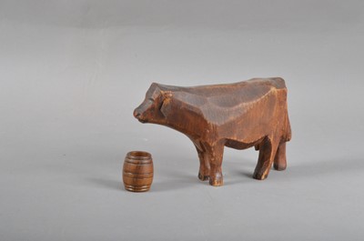 Lot 196 - An antique primitive carved wooden cow