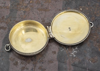 Lot 16 - An Elizabeth II silver and silver gilt travelling wafer container