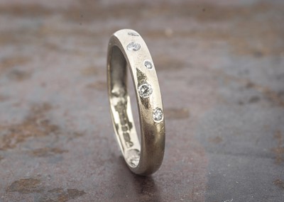 Lot 47 - An 18ct gold diamond set dress ring