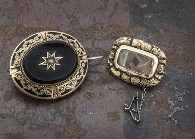 Lot 55 - Two Victorian memorial brooches
