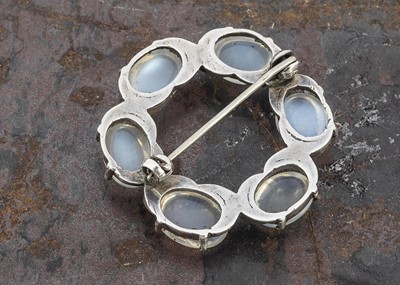 Lot 68 - A moonstone and silver wreath brooch