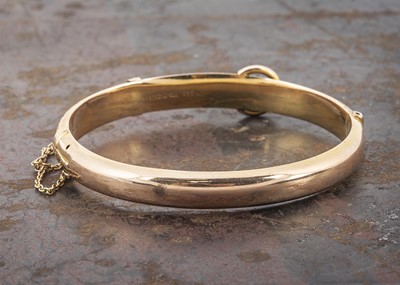 Lot 73 - A late 19th Century 9ct gold buckle bangle