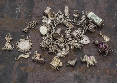 Lot 97 - A silver charm bracelet