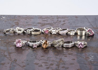 Lot 104 - A collection of gem set and silver band dress rings