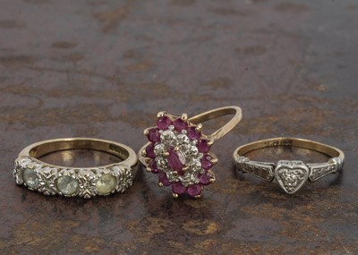 Lot 110 - Three gold gem set dress rings