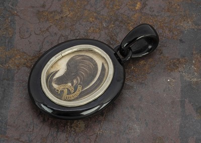 Lot 137 - A 19th jet locket