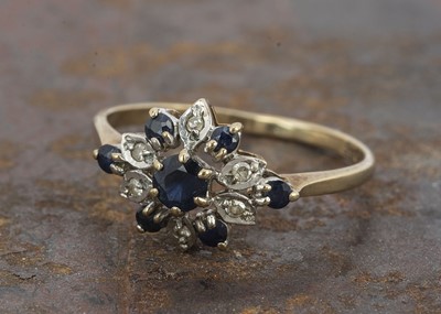 Lot 138 - A 9ct gold sapphire and diamond dress ring