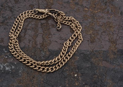 Lot 147 - An Edwardian 15ct gold curb linked double bracelet