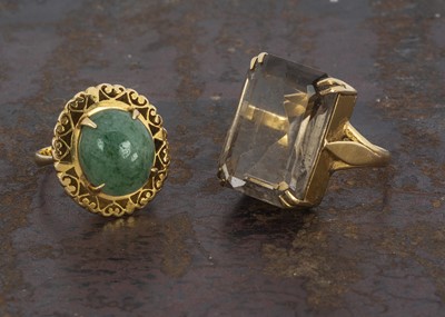 Lot 151 - Two yellow metal dress rings