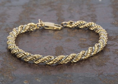 Lot 162 - A continental 14K two colour gold rope twist bracelet