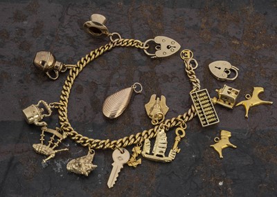 Lot 171 - A 9ct gold curb link charm bracelet