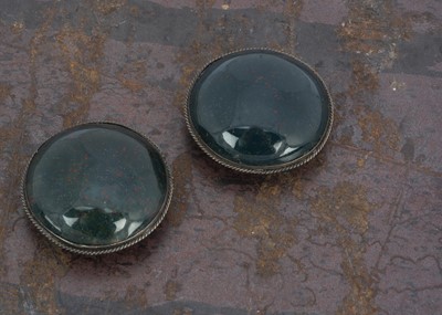 Lot 180 - A pair of 19th Century bloodstone and white metal buttons