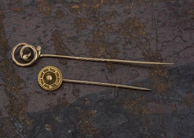 Lot 195 - Two yellow metal stick pins