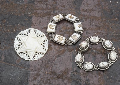 Lot 224 - An early 20th century carved mother of pearl 'Star of David' marked Bethlehem to reverse to pin, 5.1 cm diameter