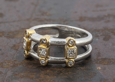 Lot 230 - A platinum, 18ct gold diamond set ring