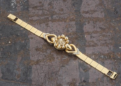 Lot 232 - An continental yellow metal and diamond set bracelet, with MuDu ladies watch movement set into the bracelet