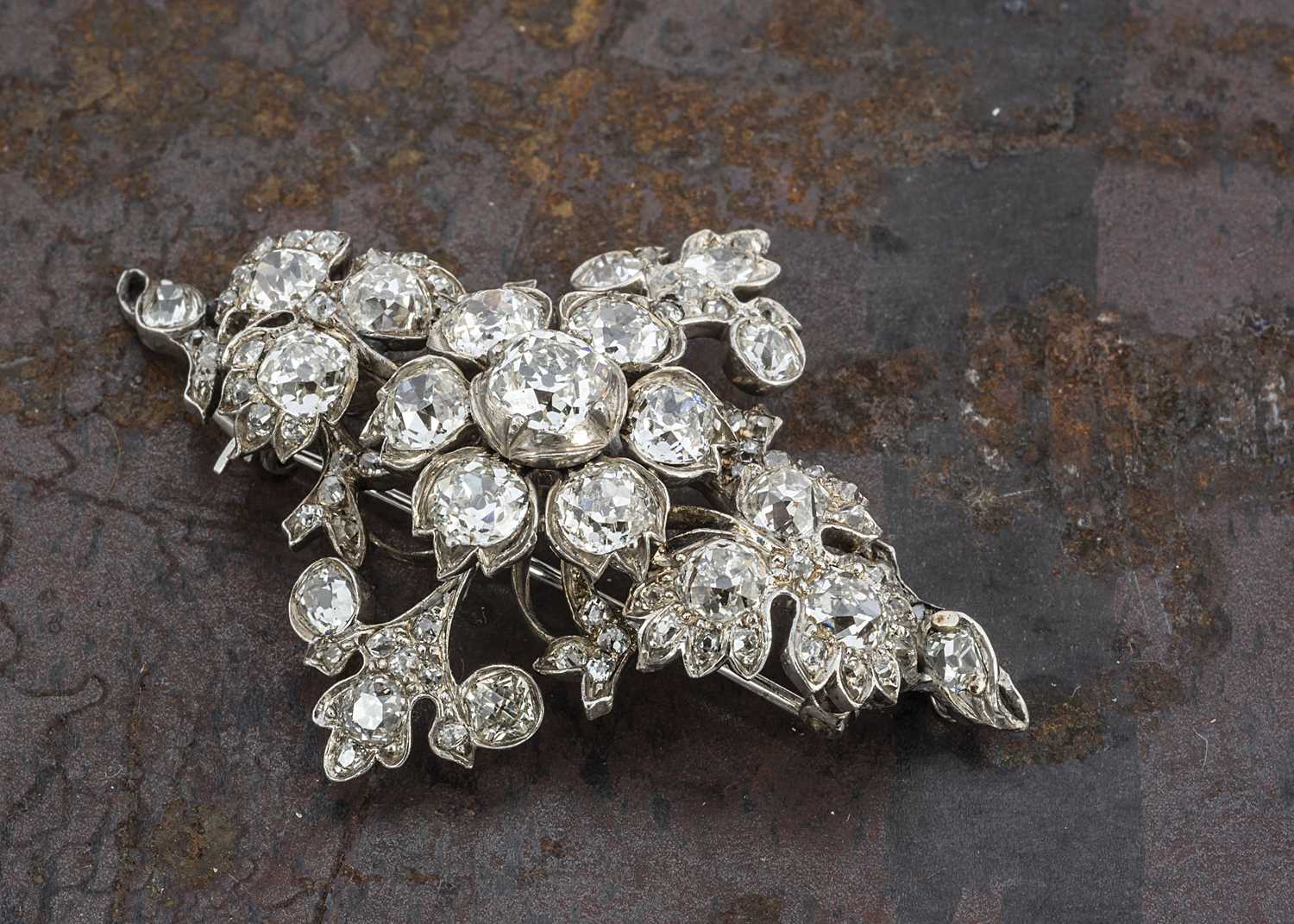 Lot 236 - A late 19th and early 20th century  navette shaped diamond cluster brooch