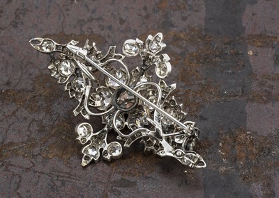 Lot 236 - A late 19th and early 20th century  navette shaped diamond cluster brooch