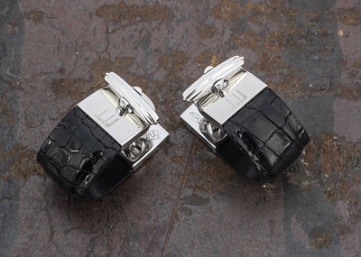 Lot 239 - A pair of Dunhill silver and simulated crocodile leather cufflinks