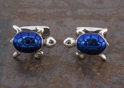 Lot 241 - A pair of Dunhill silver and petrol blue decorative tortoise cufflinks