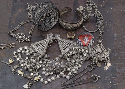 Lot 261 - A collection of Middle Eastern white metal jewels