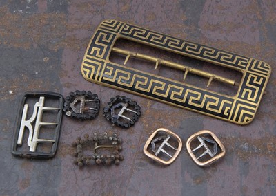 Lot 282 - A collection of buckles, including a Greek key example 10 cm by 4.1 cm, a pair of small gilt metal examples 1.9 cm by 1.7 cm and others