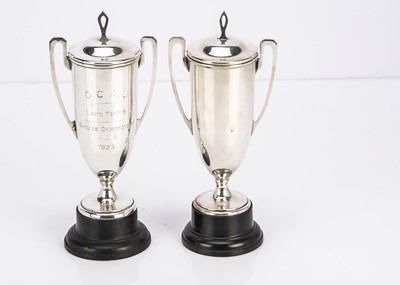 Lot 489 - A pair of 1920s silver twin handled covered trophy cups