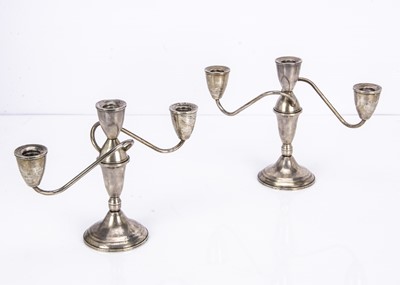 Lot 538 - A pair of modern silver filled two branch table candelabra