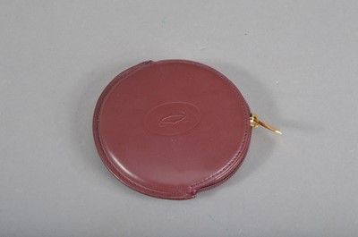 Lot 209 - A modern Must De Cartier leather coin purse