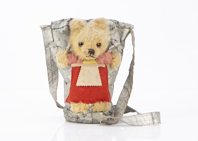 Lot 241 - A Farnell WW2 child's gas mask in a teddy bear carry case