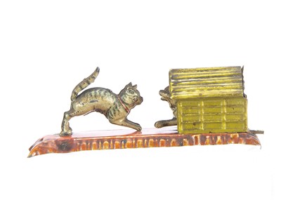 Lot 382 - A rare Meier Penny Toy  dog in kennel and leaping cat