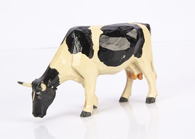 Lot 416 - A Forest Toys of Brockenhurst grazing cow